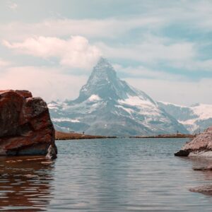 Lake Reflections - Tranquil view of the iconic Matterhorn peak refl #11917567