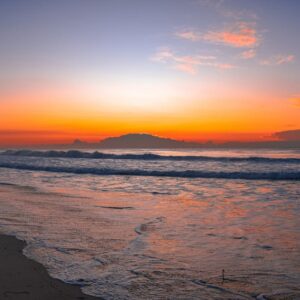 Beach Scenery - A beautiful sunrise over a tranquil ocean scene  #16354157