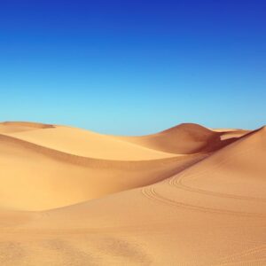 Desert Wilderness - Expansive sand dunes under a bright blue sky, ca #210307