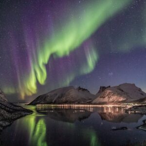 Snow Mountains - Beautiful aurora borealis over a snow-capped mou #2113566
