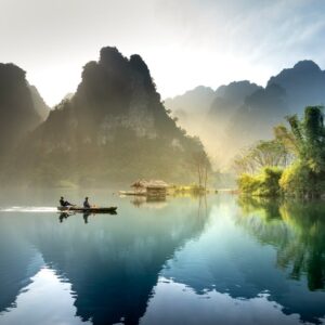 Mountain Landscapes - Tranquil lake with mountains reflecting at sunri #2166711