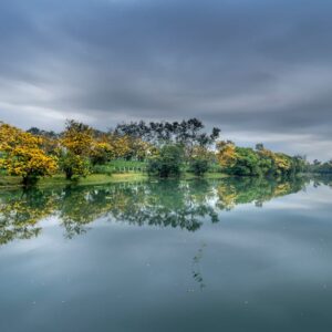 Lake Reflections - A peaceful lake reflecting vibrant autumn trees #2582722