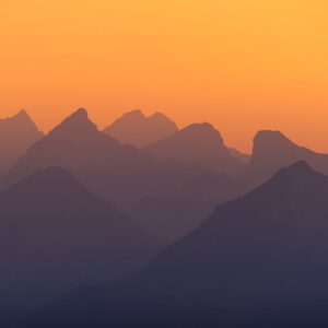 Mountain Landscapes - Beautiful silhouette of the Austrian Alps at sun #33670090