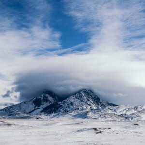Snow Mountains - Majestic snow-covered mountains beneath a dramat #3555762