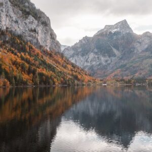Lake Reflections - Tranquil autumn scene with mountains reflecting #36103831