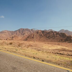 Desert Wilderness - Scenic view of rocky mountains and desert road i #36124347