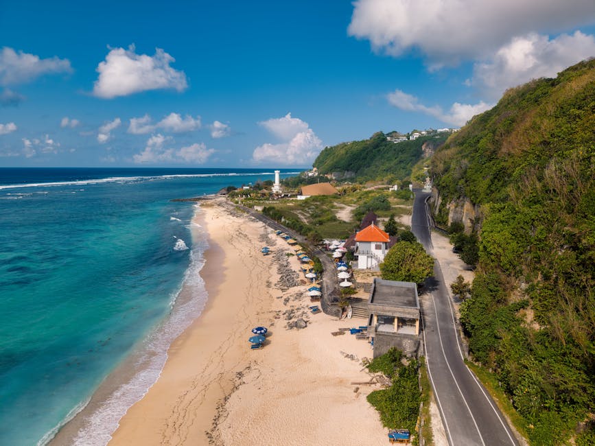 Beach Scenery - Aerial view of a Bali beach with a lighthouse an #36299199