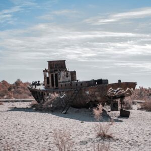 Desert Wilderness - Rusted ship stranded in the Aral Sea desert, a p #36446923