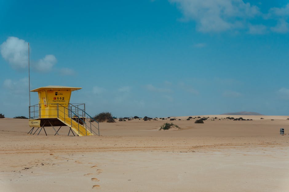 Desert Wilderness - A yellow lifeguard tower stands solitary on the #36540398
