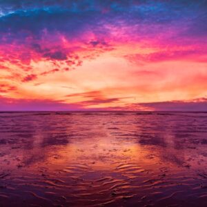 Beach Scenery - Dramatic sunset with vibrant colors reflecting o #4826377