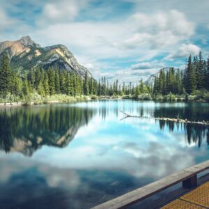Lake Reflections - Stunning view of a calm mountain lake with refle #6237703
