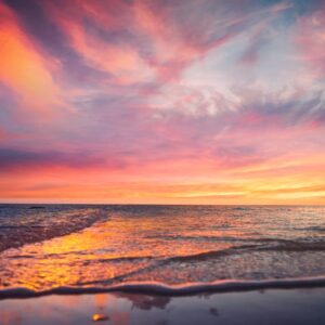Beach Scenery - A breathtaking sunset with vivid colors reflecti #6277381