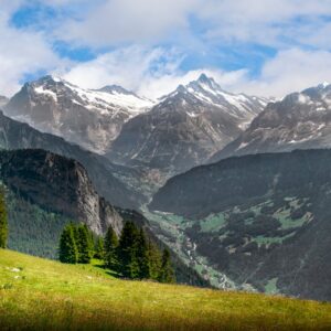 Mountain Landscapes - Scenic view of alpine mountains, lush valleys, a #6431015