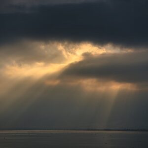 Lake Reflections - Captivating sunset rays breaking through clouds #6513731