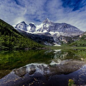 Snow Mountains - Stunning snow-capped mountains reflected in a tr #7404451