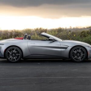 Desert Wilderness - Luxurious silver convertible car parked on an as #8375817