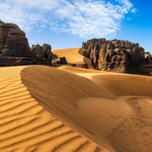 Desert Wilderness - Breathtaking view of sand dunes against rocky fo #8581676